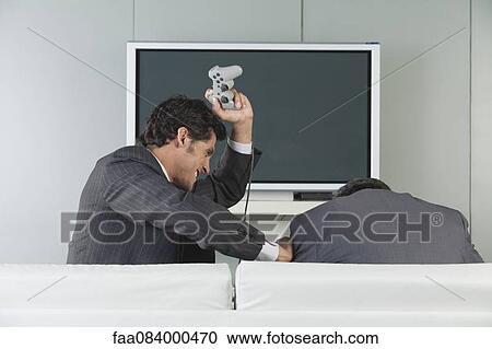 Businessmen playfighting View Large Photo Image Stock Image - Businessmen playfighting. Fotosearch