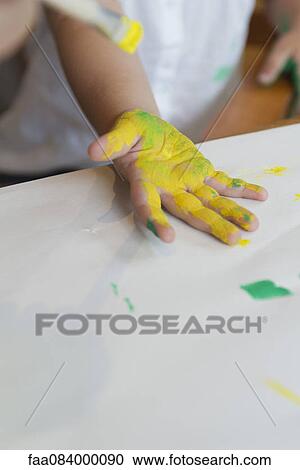 Child's hand covered in paint View Large Photo Image Stock Image - Child's hand covered in paint. Fotosearch