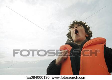 Crying boy with life jacket View Large Photo Image Stock Image - Crying boy with life jacket. Fotosearch