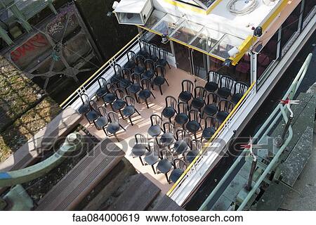 Empty chairs on tour boat deck View Large Photo Image Stock Photo - Empty chairs on tour boat deck. Fotosearch