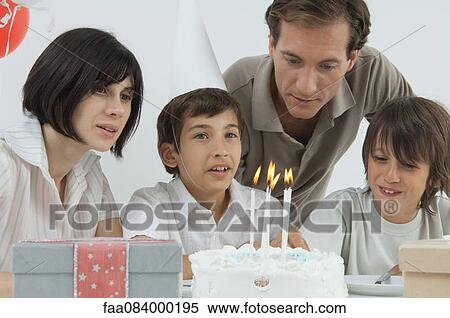 Family celebrating birthday View Large Photo Image Stock Photography - Family celebrating birthday. Fotosearch
