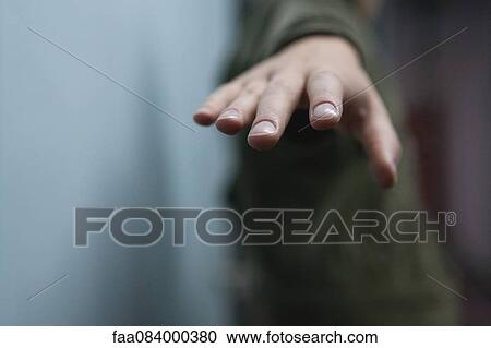 Hand reaching out, cropped View Large Photo Image Stock Image - Hand reaching out, cropped. Fotosearch