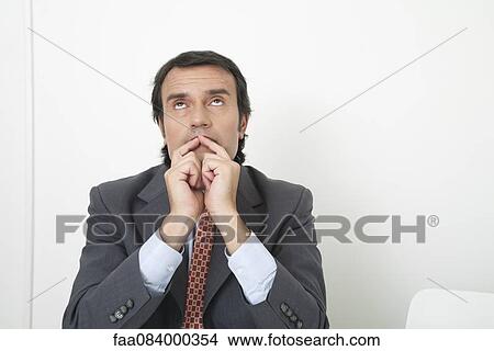 Mature businessman in thought View Large Photo Image Picture - Mature businessman in thought. Fotosearch