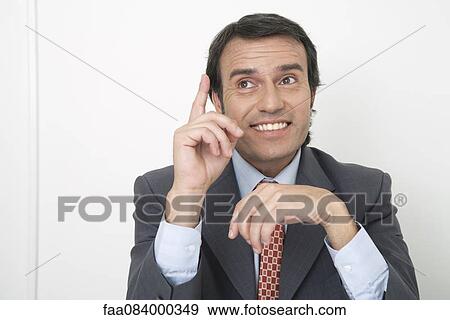 Stock Photo - Mature businessman, smiling. Fotosearch