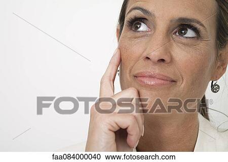 Mature woman in thought View Large Photo Image Stock Image - Mature woman in thought. Fotosearch