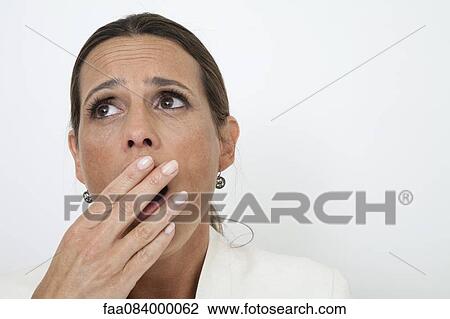 Mature woman yawning View Large Photo Image Stock Image - Mature woman yawning. Fotosearch
