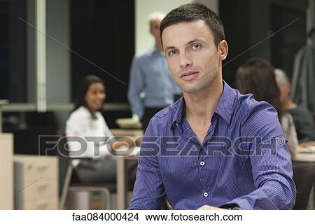 Mid-adult businessman, portrait View Large Photo Image Picture - Mid-adult businessman, portrait. Fotosearch