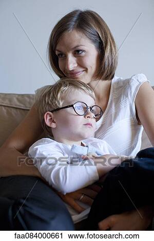 Mother embracing little boy View Large Photo Image Stock Image - Mother embracing little boy. Fotosearch