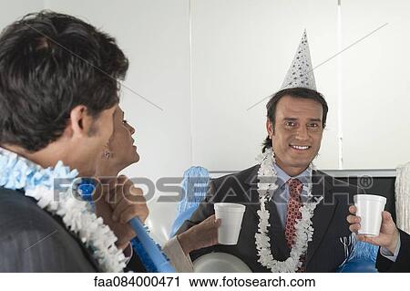 Office celebration, mature man looking at camera View Large Photo Image Stock Image - Office celebration, mature man looking at camera. Fotosearch