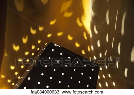 Pattern created by perforated lamp View Large Photo Image Stock Image - Pattern created by perforated lamp. Fotosearch
