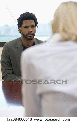 Stock Photograph - Professional man in job interview. Fotosearch