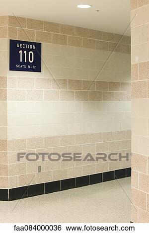 Stock Photograph - Section number sign on tiled wall. Fotosearch