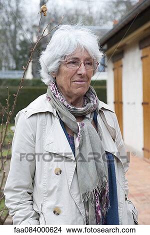 Senior woman outdoors, portrait View Large Photo Image Picture - Senior woman outdoors, portrait. Fotosearch