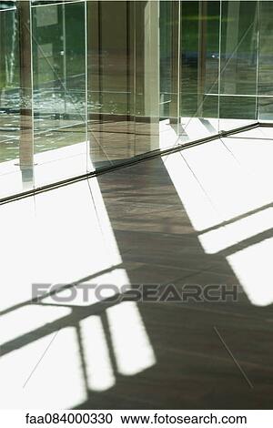 Stock Image - Shadow on lobby floor. Fotosearch