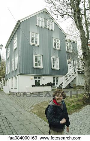 Smiling boy walking in a city, Reykjavik View Large Photo Image Stock Photo - Smiling boy walking in a city, Reykjavik. Fotosearch