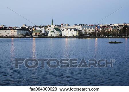 Stock Photo - Tj? rnin lake at dusk, Reykjavi. Fotosearch