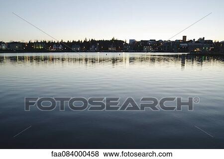 Tj? rnin lake at dusk, Reykjavi View Large Photo Image Stock Photo - Tj? rnin lake at dusk, Reykjavi. Fotosearch
