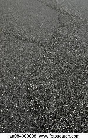 Stock Photo - Traces on the sea of black sand, iceland. Fotosearch