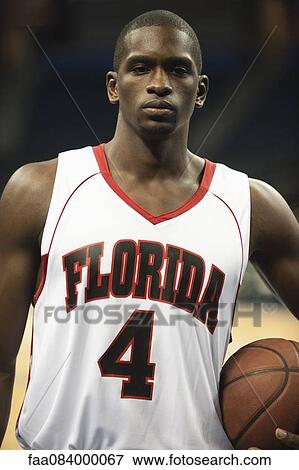 Young basketball player, portrait View Large Photo Image Stock Photo - Young basketball player, portrait. Fotosearch