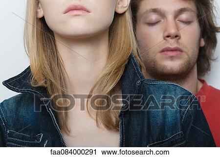 Young couple, man's eyes closed View Large Photo Image Stock Image - Young couple, man's eyes closed. Fotosearch