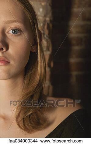 Picture - Young woman, cropped portrait. Fotosearch