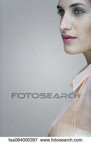 Stock Photo - Young woman in profile, portrait. Fotosearch
