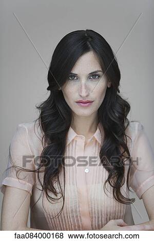 Stock Photo - Young woman, portrait. Fotosearch
