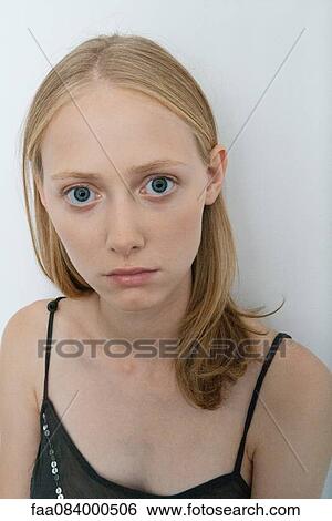 Stock Photograph - Young woman, portrait. Fotosearch