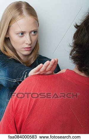 Young woman pushing man away, cropped View Large Photo Image Stock Image - Young woman pushing man away, cropped. Fotosearch
