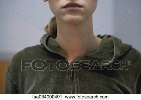 Young woman wearing sweatshirt, cropped View Large Photo Image Stock Image - Young woman wearing sweatshirt, cropped. Fotosearch