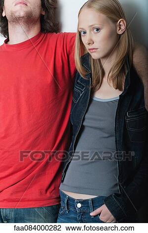 Young woman with boyfriend, portrait View Large Photo Image Stock Image - Young woman with boyfriend, portrait. Fotosearch