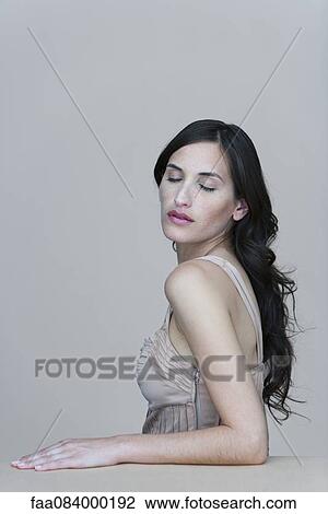 Young woman with eyes closed, portrait View Large Photo Image Stock Image - Young woman with eyes closed, portrait. Fotosearch