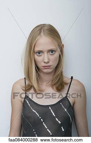 Young woman with unhappy expression, portrait View Large Photo Image Stock Photo - Young woman with unhappy expression, portrait. Fotosearch