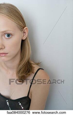 Young woman with worried expression, portrait View Large Photo Image Stock Photograph - Young woman with worried expression, portrait. Fotosearch