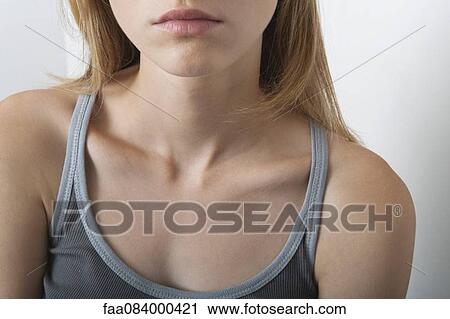 Young woman's chest View Large Photo Image Stock Image - Young woman's chest. Fotosearch