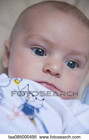 Baby lying on back View Large Photo Image Stock Photography - Baby lying on back. Fotosearch