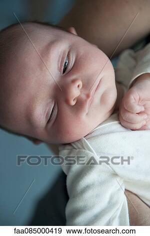 Baby napping, portrait View Large Photo Image Stock Photo - Baby napping, portrait. Fotosearch
