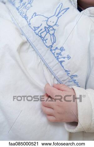 Stock Image - Baby's hand, cropped. Fotosearch