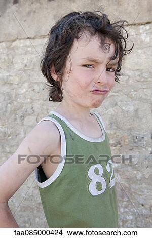 Picture - Boy making face. Fotosearch