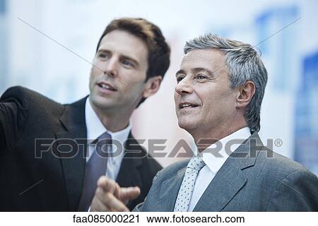 Business partners outdoors View Large Photo Image Stock Image - Business partners outdoors. Fotosearch