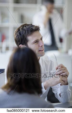 Businessman meeting with colleagues View Large Photo Image Stock Image - Businessman meeting with colleagues. Fotosearch