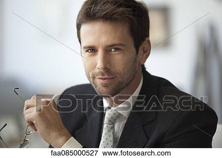 Stock Photo - Businessman, portrait. Fotosearch