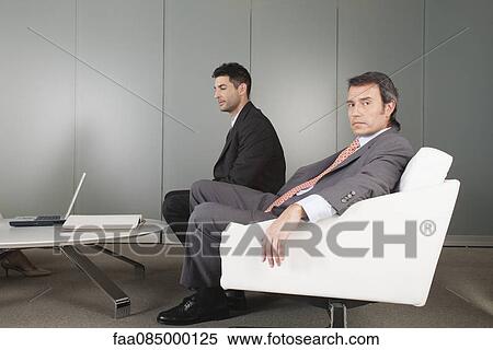 Businessmen in meeting View Large Photo Image Stock Photography - Businessmen in meeting. Fotosearch