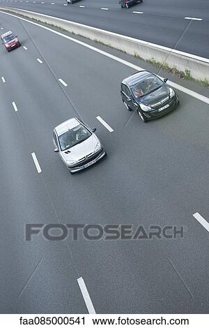 Stock Image - Cars drving on freeway. Fotosearch
