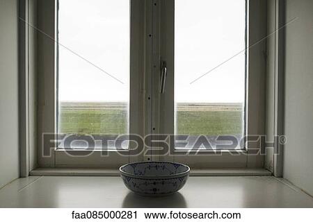 Ceramic bowl in front of window View Large Photo Image Stock Image - Ceramic bowl in front of window. Fotosearch