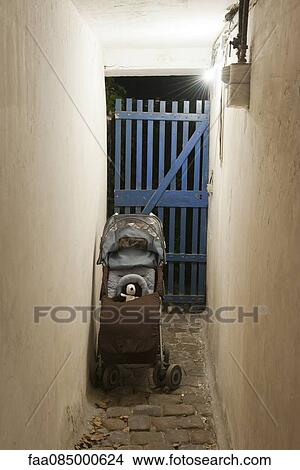 Child's stroller and stuffed toy in corridor View Large Photo Image Picture - Child's stroller and stuffed toy in corridor. Fotosearch