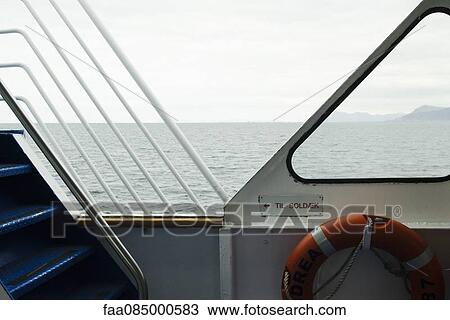 Deck of a ship and life belt, overlooking the horizon View Large Photo Image Stock Image - Deck of a ship and life belt, overlooking the horizon. Fotosearch