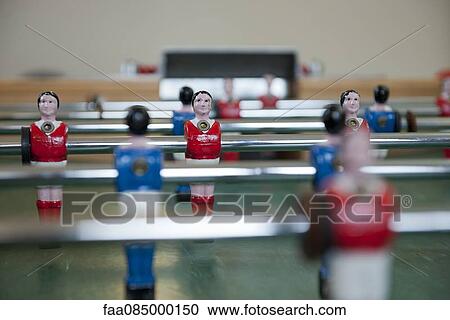 Stock Image - Foosball table, close-up. Fotosearch