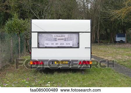 For sale sign and telephone number posted on trailer View Large Photo Image Stock Photo - For sale sign and telephone number posted on trailer. Fotosearch