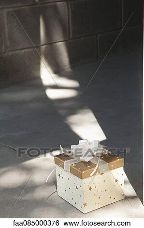 Stock Photograph - Gift, outdoors. Fotosearch